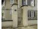 View of the property's front gate, showing the address number, fence and brick pillar at 33 Pitt St # 3, Charleston, SC 29401