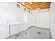 On-site laundry room with rows of washers, dryers, and numbered lockers at 33 Pitt St # 3, Charleston, SC 29401