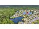 Aerial view of the community nestled around a lake surrounded by lush greenery at 3310 Hartwell St, Johns Island, SC 29455