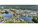 Beautiful aerial view of a lakeside residential community nestled in lush greenery, offering serene waterfront living at 3310 Hartwell St, Johns Island, SC 29455