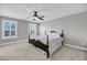 Bedroom with neutral walls, plush carpet, a ceiling fan and natural light from two windows at 3310 Hartwell St, Johns Island, SC 29455