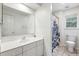 Bathroom with a large mirror, vanity, and custom shower curtain at 334 Mossy Oak Way, Mount Pleasant, SC 29464