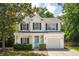 Charming two-story home with a manicured front yard and attached garage at 334 Mossy Oak Way, Mount Pleasant, SC 29464