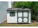 Outdoor shed with double doors and one window, ideal for storage at 334 Mossy Oak Way, Mount Pleasant, SC 29464