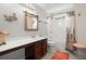 Stylish bathroom featuring a vanity with storage, a shower-tub combo, and decorative accents at 3364 Middlesboro Ave, Summerville, SC 29485