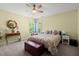 Inviting bedroom with a patterned bedspread, end tables, and a sunny window at 3364 Middlesboro Ave, Summerville, SC 29485