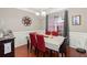 Inviting dining room with hardwood floors, bright natural light, and seating for six at 3364 Middlesboro Ave, Summerville, SC 29485