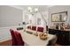 Spacious dining room with hardwood floors and seating for six, perfect for entertaining at 3364 Middlesboro Ave, Summerville, SC 29485