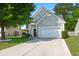 Charming home with a well-manicured lawn, two-car garage, and inviting curb appeal at 3364 Middlesboro Ave, Summerville, SC 29485
