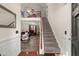 Inviting foyer with a staircase leading to the upper level and open access to living spaces at 3364 Middlesboro Ave, Summerville, SC 29485