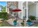 Cozy front entrance featuring a bistro set and decorative potted plants at 3364 Middlesboro Ave, Summerville, SC 29485