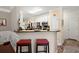 Cozy kitchen bar area with seating for two and seamless access to the kitchen at 3364 Middlesboro Ave, Summerville, SC 29485