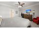 Spacious main bedroom with a view of the ensuite bathroom, a ceiling fan, and a chest of drawers at 3364 Middlesboro Ave, Summerville, SC 29485