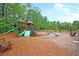 Playground with slides, swings, climbing area, and benches provides a fun space for community children at 3364 Middlesboro Ave, Summerville, SC 29485