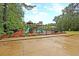 Community playground with multiple play structures and a safety fence at 3364 Middlesboro Ave, Summerville, SC 29485
