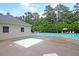 Community pool featuring a jacuzzi, lounge chairs, and lush landscaping provides a refreshing escape at 3364 Middlesboro Ave, Summerville, SC 29485