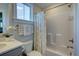 Bathroom featuring a vanity and a tub/shower with white ruffled curtain at 3539 Habenaria Rd # 28, Mount Pleasant, SC 29466