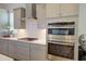 This kitchen features shaker cabinets, stainless steel appliances and a white subway tile backsplash at 3539 Habenaria Rd # 28, Mount Pleasant, SC 29466