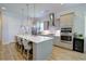 Well-appointed kitchen with a spacious island, modern appliances, and stylish pendant lights, perfect for cooking at 3539 Habenaria Rd # 28, Mount Pleasant, SC 29466