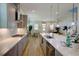 Contemporary kitchen showcasing a sleek island, stainless steel appliances, and open layout to the dining area at 3539 Habenaria Rd # 28, Mount Pleasant, SC 29466
