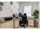 Well-lit home office with a large desk, comfortable chair, and ample storage at 3539 Habenaria Rd # 28, Mount Pleasant, SC 29466