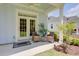 Charming covered patio with comfortable seating and views of the backyard at 3539 Habenaria Rd # 28, Mount Pleasant, SC 29466