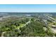 Aerial view of home nestled within a dense canopy of trees at 3872 James Bay Road Rd, Johns Island, SC 29455