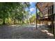 Expansive backyard view with mature trees and covered deck at 3872 James Bay Road Rd, Johns Island, SC 29455
