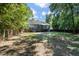 View of the backyard surrounded by lush trees at 3872 James Bay Road Rd, Johns Island, SC 29455