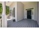 Exterior view highlighting the home's front porch and door, siding, and a side window at 3872 James Bay Road Rd, Johns Island, SC 29455