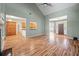 Bright, open-concept living room featuring hardwood floors and a soaring vaulted ceiling at 3872 James Bay Road Rd, Johns Island, SC 29455