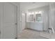 Bright bathroom features a double vanity, updated fixtures, and a separate shower at 411 Bering Ln, Summerville, SC 29486