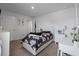 Cozy bedroom featuring a large window, carpeted floors, neutral paint, and a black and white floral patterned comforter at 411 Bering Ln, Summerville, SC 29486