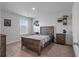A bedroom with wood furniture and neutral colors that make it a blank space to add personal touches at 411 Bering Ln, Summerville, SC 29486