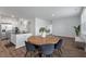 Bright living area with wood floors, modern furniture, and views into the kitchen at 411 Bering Ln, Summerville, SC 29486