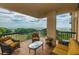 Relaxing tiled balcony features comfortable seating and gorgeous ocean views at 4209 Ocean Club Dr, Isle of Palms, SC 29451