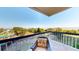 Enjoy ocean views from this private balcony with comfortable seating and cool breezes at 4209 Ocean Club Dr, Isle of Palms, SC 29451