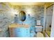 Charming bathroom with unique wallpaper, single vanity, and a shower/tub combo at 4209 Ocean Club Dr, Isle of Palms, SC 29451