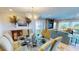 Dining area boasts stylish lighting, table setting and decor, complemented by a bright, airy ambiance at 4209 Ocean Club Dr, Isle of Palms, SC 29451