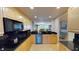A bright and open kitchen with stainless steel appliances and a spacious island at 4209 Ocean Club Dr, Isle of Palms, SC 29451