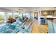 Stylish living room with a wet bar featuring a wine cooler, perfect for entertaining guests at 4209 Ocean Club Dr, Isle of Palms, SC 29451