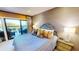 Cozy bedroom featuring a private balcony with outdoor seating, perfect for enjoying tranquil views at 4209 Ocean Club Dr, Isle of Palms, SC 29451