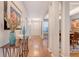 Hallway with wood floors leads to dining and living areas at 422 Cabrill Dr, Charleston, SC 29414