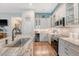 Modern kitchen with granite countertops, a wine fridge, and stainless steel appliances at 422 Cabrill Dr, Charleston, SC 29414