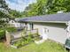 Backyard featuring a deck, lush lawn, and mature trees create a private retreat for relaxation and outdoor activities at 5 Drummond Ct, Charleston, SC 29414