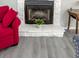 Close up of the decorative fireplace with gray flooring and stylish furnishings at 5 Drummond Ct, Charleston, SC 29414