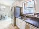 Open kitchen with stainless steel appliances and view into the dining room at 5 Drummond Ct, Charleston, SC 29414
