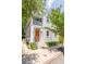 Beautiful two-story home with a front porch, mature trees, and street access at 50 South St, Charleston, SC 29403