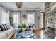 Cozy living room featuring stylish decor, comfortable seating, and a decorative fireplace at 50 South St, Charleston, SC 29403