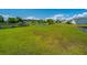 Expansive backyard overlooking a serene pond and lush greenery at 5042 Thornton Dr, Summerville, SC 29485
